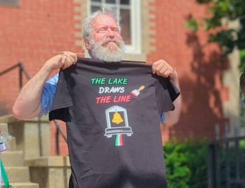 Adams Street neighbors band together and repaint Italian flag lines for Festa